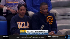 Hai người nổi tiếng! Westbrook và vợ Nina xem trận đấu của UCLA